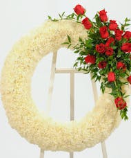 White Wreath Accented with Roses on Easel